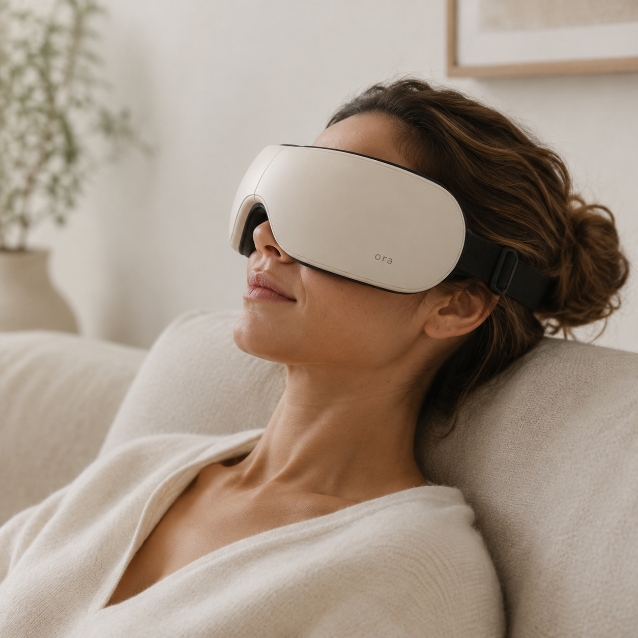 AI lifestyle concept of a woman relaxing at home wearing Ora